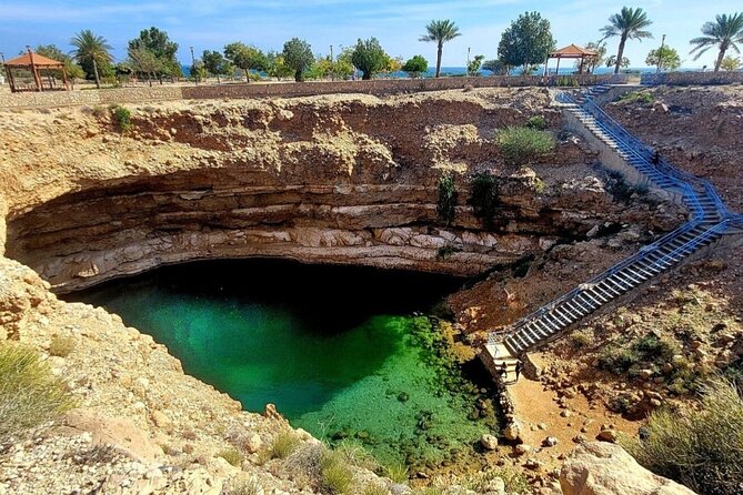 5 Days 4 Nights Shared Tour in Oman - Green plantations and white sand at Wadi Tiwi and Fins Beach