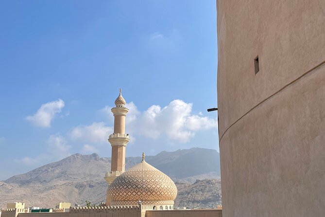 AMOUAGE: Full Day Private Tour to Nizwa and Jebel Akhdar - Nizwa Souq: dates, silver, and everyday Oman