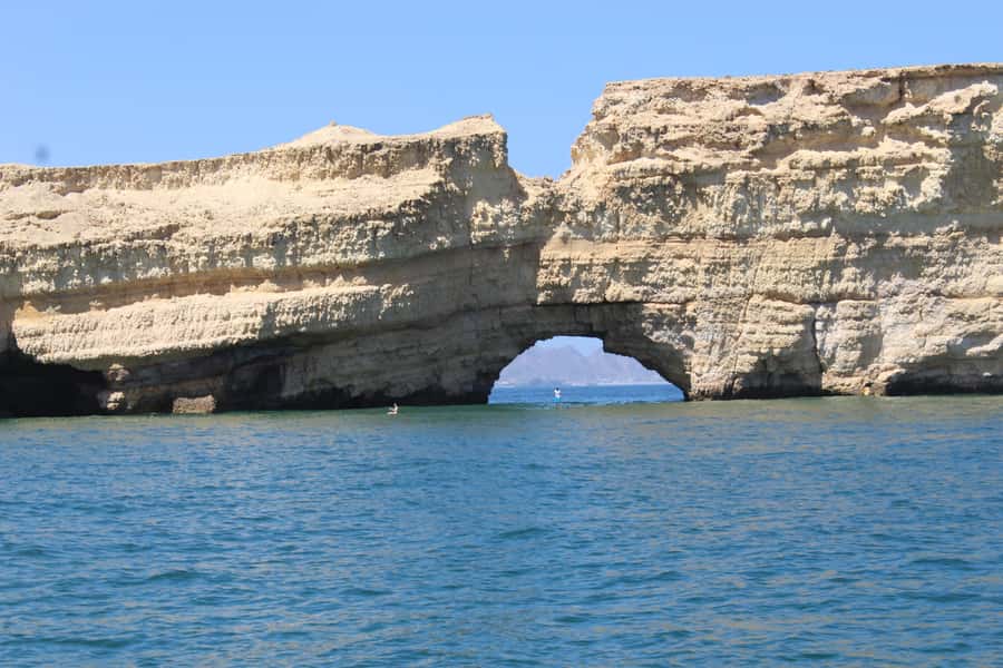 Coastal & Sunset Cruise in Muscat - Entering Muscat’s natural harbor near sunset