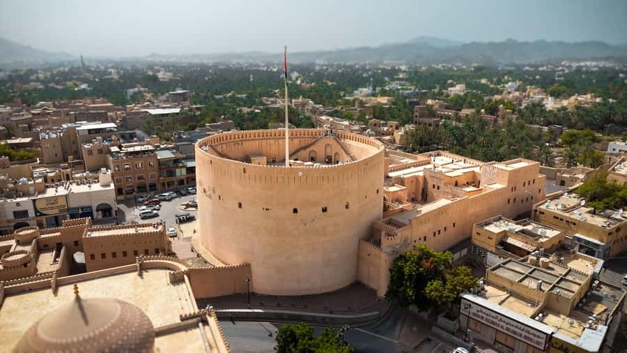 From Muscat: Nizwa and Jebel Akhdar Tour with Lunch - Nizwa Souq: dates, silver, and Omani everyday life