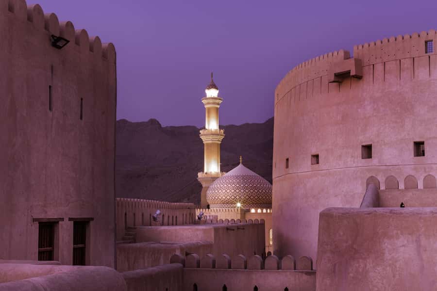 From Muscat: Nizwa Guided Tour with Optional Overnight Stay - Nizwa Fort at dusk