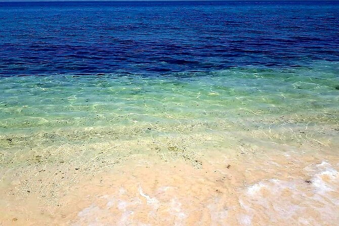 Full Day Group Tour to Wadi Shab Bimmah Sinkhole and Fins Beach - Key points at a glance
