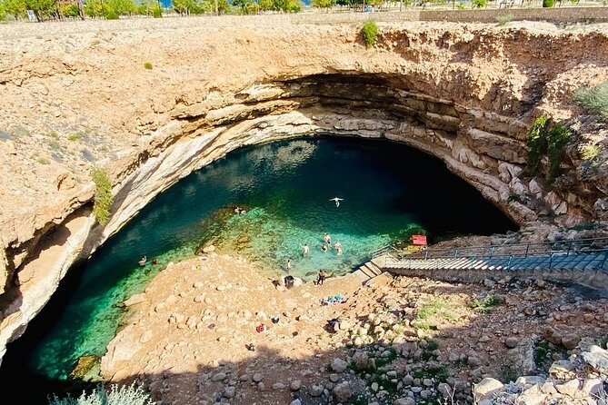 Full Day Group Tour to Wadi Shab Bimmah Sinkhole and Fins Beach - The cave swim is thrilling, but not for everyone