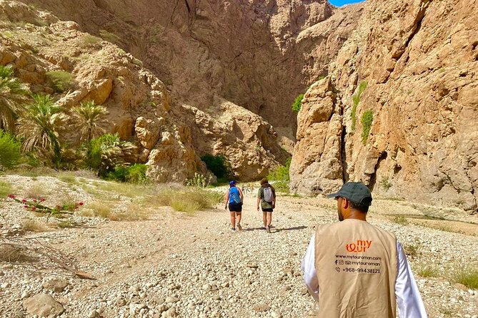 Full Day Tour in Wadi Shab - Walking into Wadi Shab’s rocky gorge
