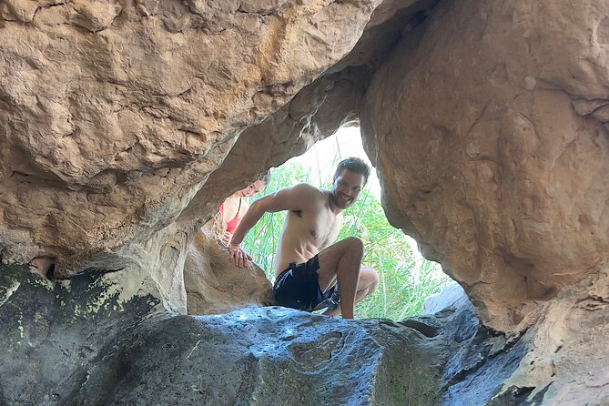 Full Day Wadi Shab And Bimah Sinkhole with Pick Up Included - Swimming to the hidden waterfall