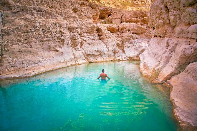Full Day Wadi Shab And Bimah Sinkhole with Pick Up Included - Walking through Wadi Shab’s canyon