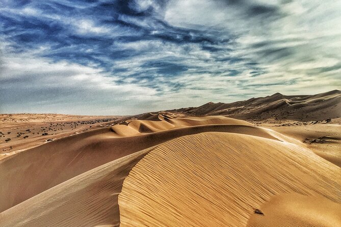 Full-Day Wahiba Desert and Wadi Bani Khalid Group Tour - Meeting a Bedouin family in the desert
