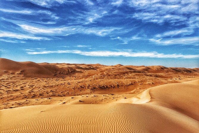 Full-Day Wahiba Desert and Wadi Bani Khalid Group Tour - Wahiba Sands: orange dunes and 4WD excitement