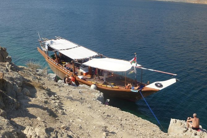 Half Day Dolphin Watching Musandam Dhow Cruise - Watching dolphins beside the dhow
