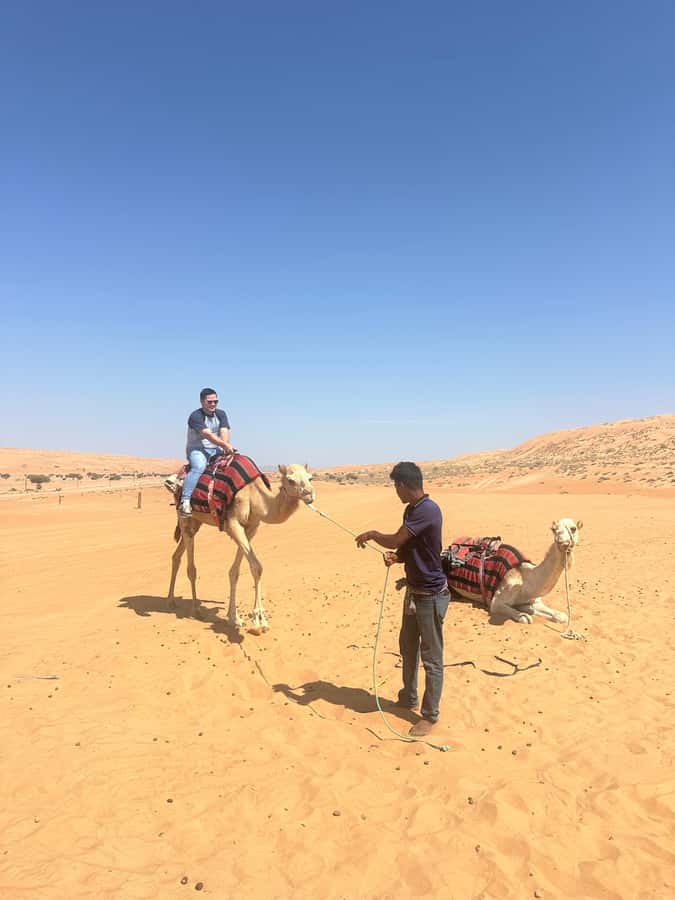 Muscat: Bidiya Desert Sunset Camel Ride with Transfer - Sunset on the dunes is the best use of your time
