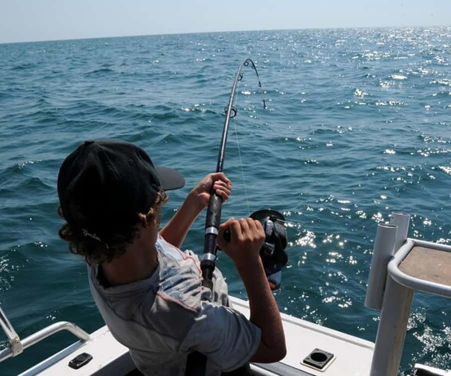 Muscat: Fishing Trip with Equipments - A semi-shaded speedboat for a private group