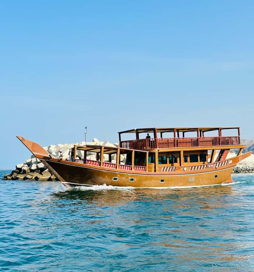 Muscat: Omani Dhow Coastal and Sunset Cruise - The coastal route: palaces, forts, and big ships