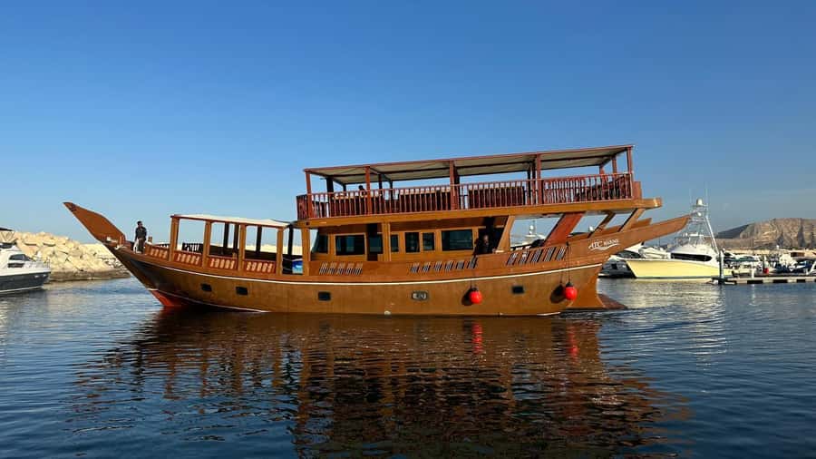 Muscat: Omani Traditional Dhow Sunset Cruise - Setting out from Muscat for a short sea escape