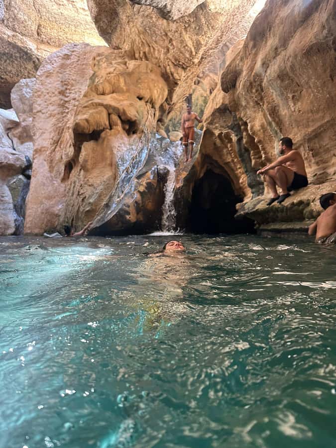Muscat: Wadi Shab & Bimmah Sinkhole Tour with Pickup & Lunch - Swimming at Bimmah Sinkhole