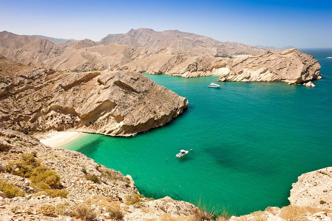 Omani dhow:Coastal and Sunset Cruise - Entering Muscat’s harbor beside Qasr Al Alam