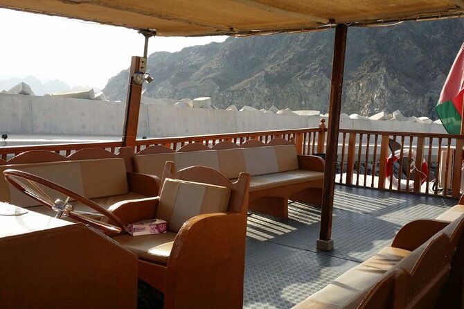 Omani Traditional Dhow Cruise: Sunset and Muscat Coastal View - Al Jalali Fort Across the Old Harbor