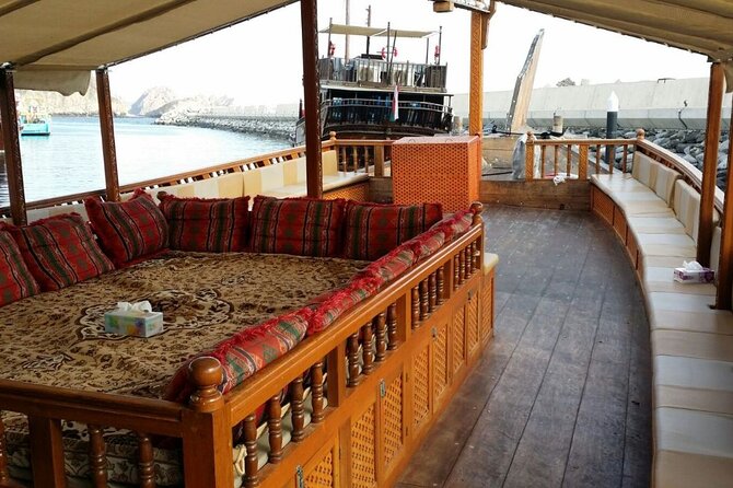 Omani Traditional Dhow Cruise: Sunset and Muscat Coastal View - The Sunset Pause and Evening Lights