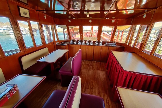 Omani Traditional Dhow Cruise: Sunset and Muscat Coastal View - Omani Coffee, Dates, and the Crew