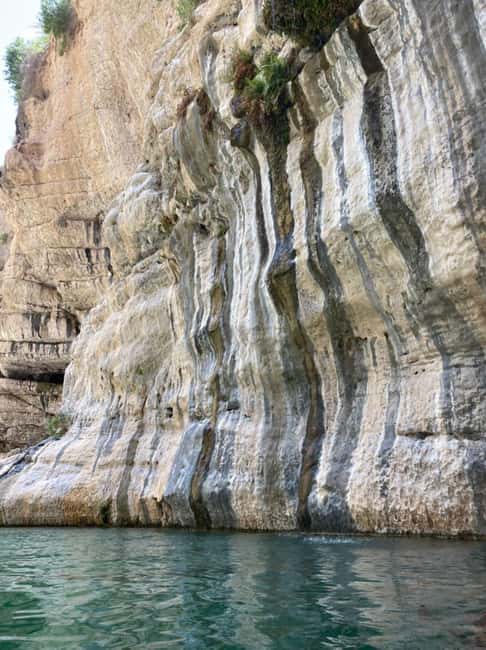 Private Day Trip to Wadi Tiwi, Fins Beach, Bimmah Sinkhole - Fins Beach brings the sea into the day