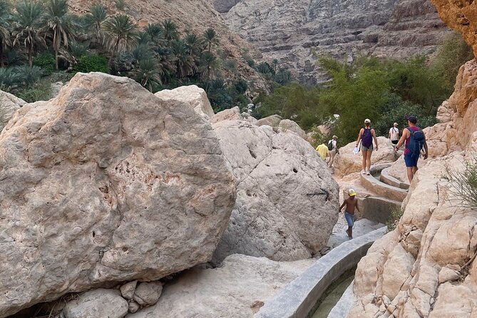 Private Full- Day Wadi Shab-Bimmah Sinkhole-Fins Beach Tour - Fins Beach and the blue coastal water