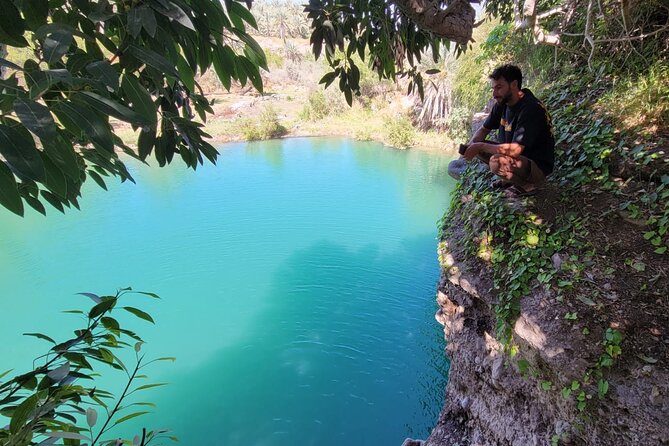 Wadi Alhoqain Thrill Seeker's Oasis - Blue Lake and the waterfall setting