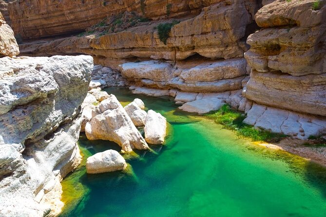 Wadi Shab and Bimmah Sinkhole Full Day Tour - The short boat crossing needs cash