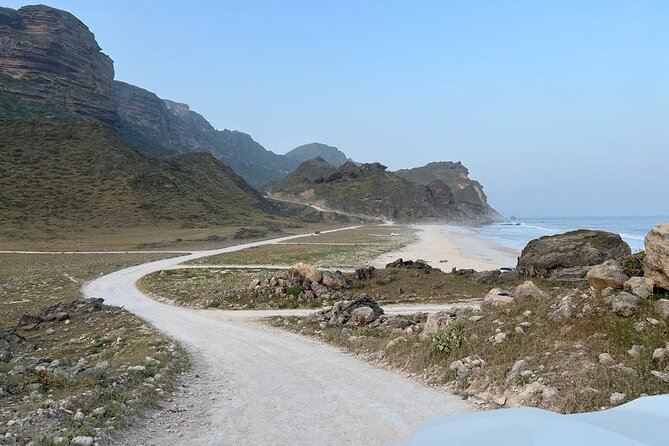 West Salalah Tour - Caribbean of Orient - Fazayah Beach with City - A photo stop at Afoul Beach